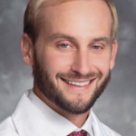 Adam J. Kincaid,  MD