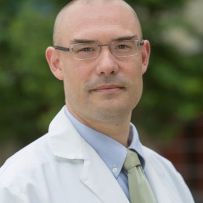 Tazo Inui,  MD